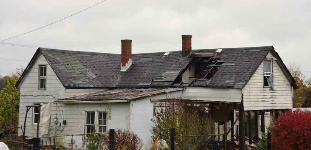 roof replacement insurance storm damaged home Chicago
