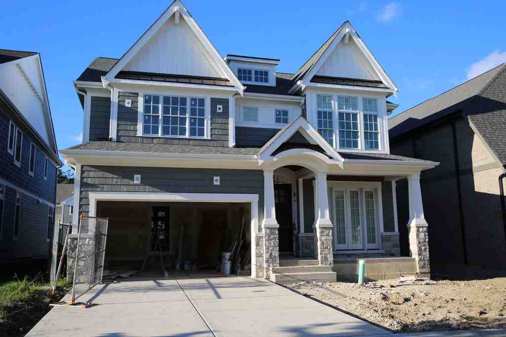 Hardie board siding installation on a residential exterior